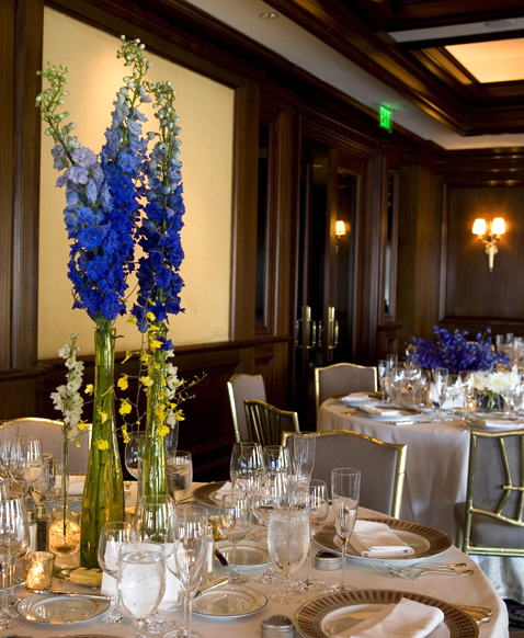 Tall Table Arrangement in Yellow and Blue Photo by Jim Canole Photography