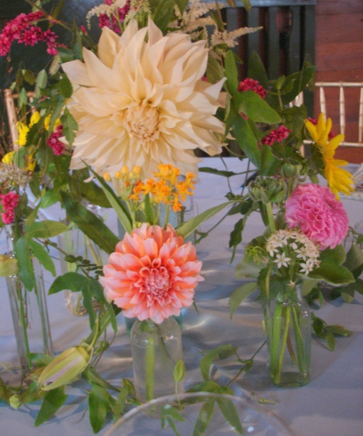 Collection of Antique Bottles filled with Dahlias